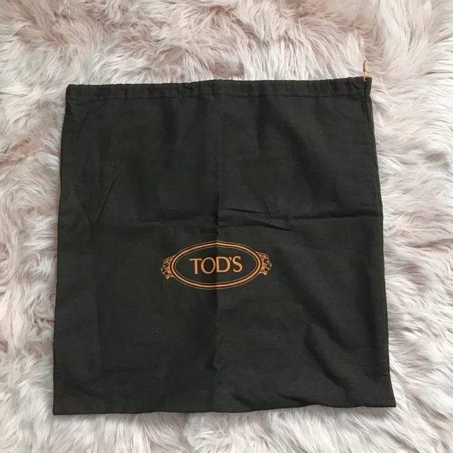Large Tod’s Drawstring Dust Bag in brown|red from Poshmark, photo 1 of 1