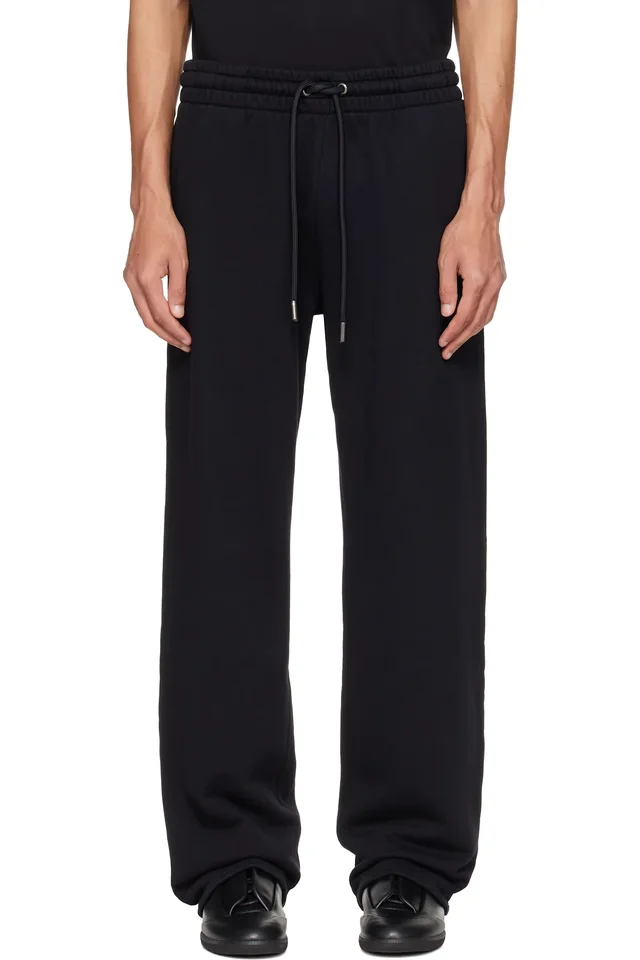 Off-White Black Rubbed Paint Arrows Sweatpants from SSENSE, photo 1 of 1