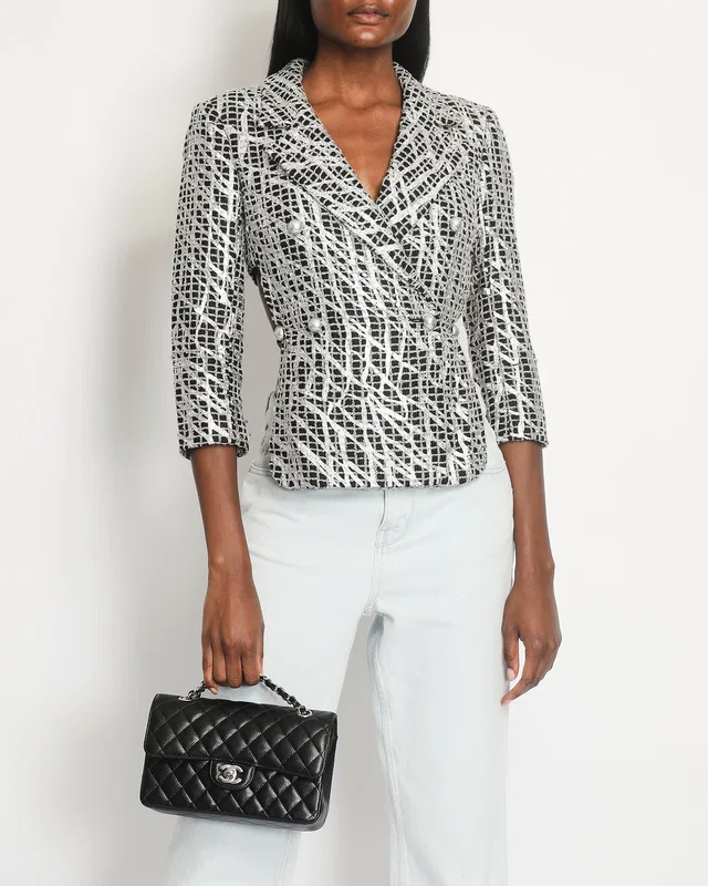 Chanel Spring 2012 Black & White Checked Tweed Backless Jacket with Silver Screen Print and Pearl… in Black Tweed from Sellier