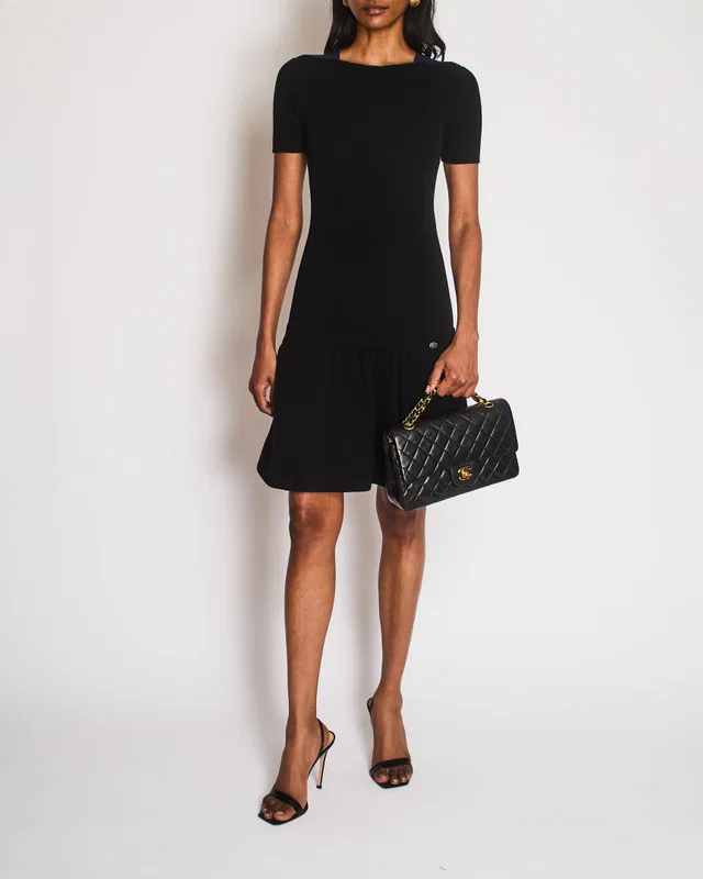 Chanel Black Wool and Cashmere Blend Ribbed Short-Sleeved Mini Dress with Navy Shoulder Details and… in Black Cashmere from Sellier