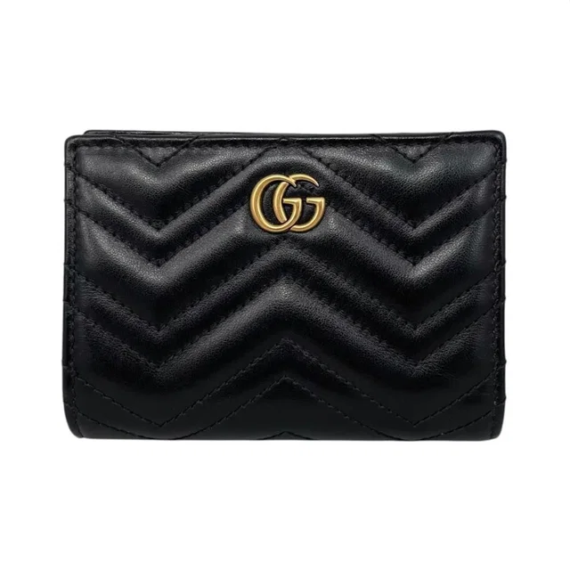 Gucci Bifold Wallet Double Quilted Leather Logo Black Gold in Black Leather from The Reluxe