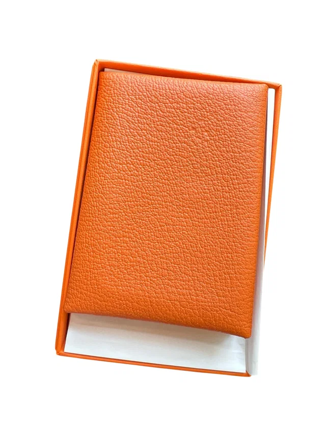Hermès Calvi Duo Compact Orange Chevre PHW #W in Orange Goatskin from Luxury Promise
