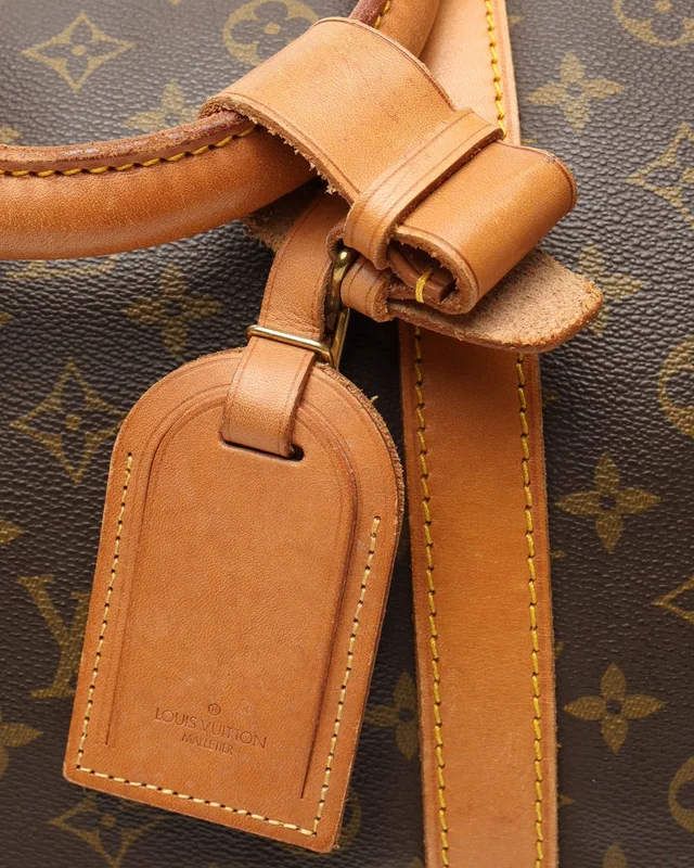 Louis Vuitton Monogram Keepall Bandoulière 60 Weekend Bag in Coated canvas from A Retro Tale, photo 9 of 11