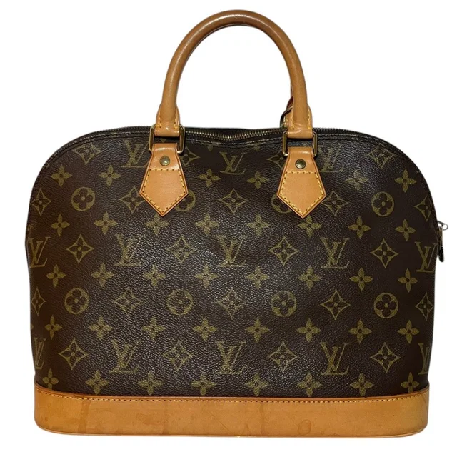 Louis Vuitton Alma Monogram Handbag Canvas in Canvas from The Reluxe
