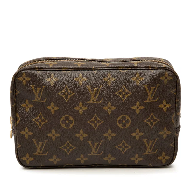 Brown Louis Vuitton Monogram Trousse Toilette 23 Clutch Bag in Brown Coated canvas from Designer Revival