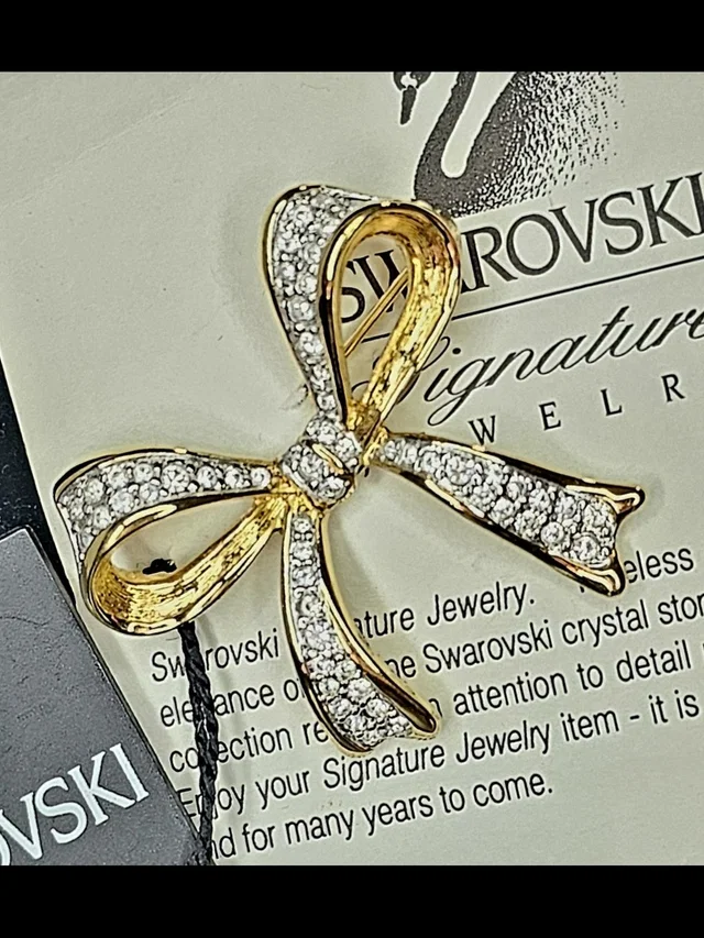 Swarovski Gold Bow Crystal Pave Brooch in gold|white from Poshmark