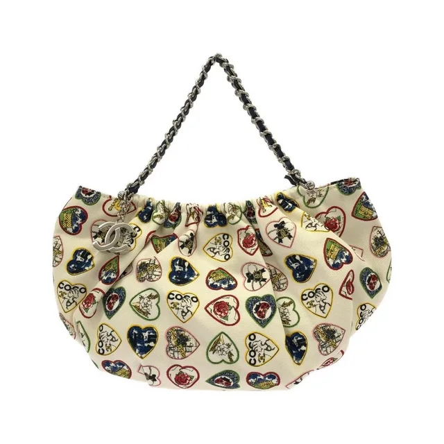 Chanel 31412 Handbag in brown|neutral Canvas from Poshmark, photo 1 of 1