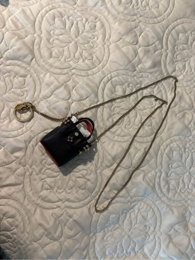 Christian Louboutin Miniature Bag in red|black from Poshmark
