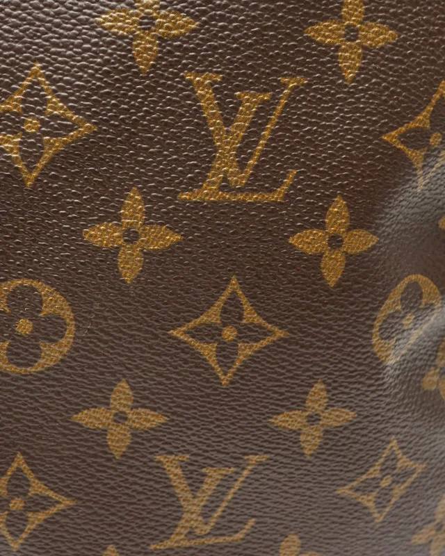Louis Vuitton Monogram Keepall Bandoulière 60 Weekend Bag in Coated canvas from A Retro Tale, photo 8 of 15