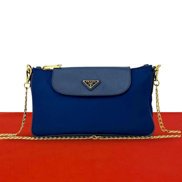 Prada Triangle Logo Tessuto Nylon Saffiano Leather Chain Shoulder Bag Pochette in Saffiano leather from The Reluxe