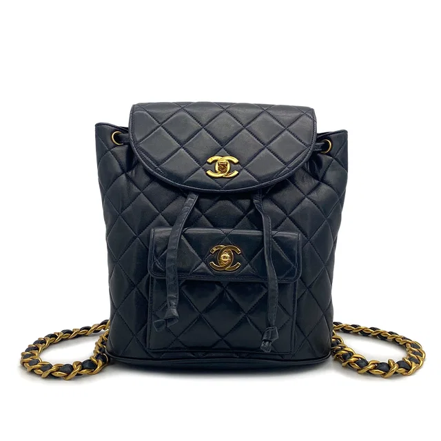 Chanel Vintage Matelasse Chain Backpack Navy Lamb Skin Gold Hardware in Navy from Luxury Promise