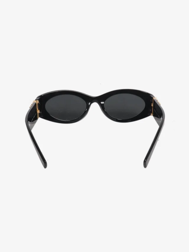 Miu Miu Black abd gold oval sunglasses in Black from Sign of the Times, photo 4 of 7