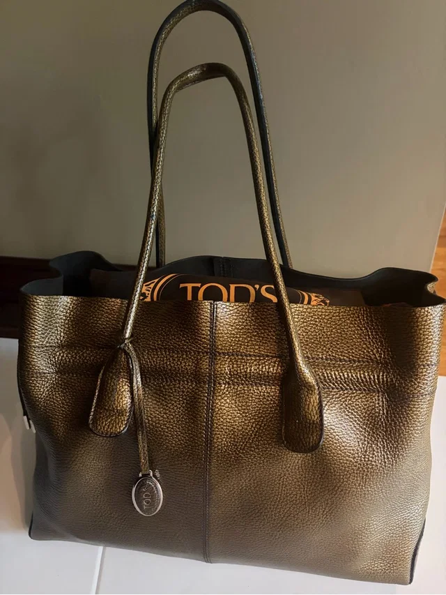 Tod's Metallic Bronze Pebbled Leather D-Bag Tote With Charm in brown|red Leather from Poshmark