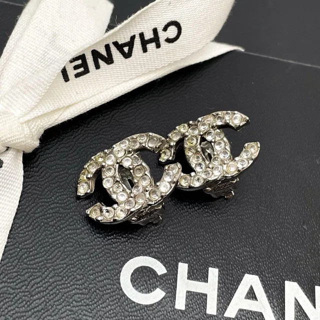 Chanel CC Logo Earrings 03A Rhinestone Icon Silver in Silver Leather from The Reluxe