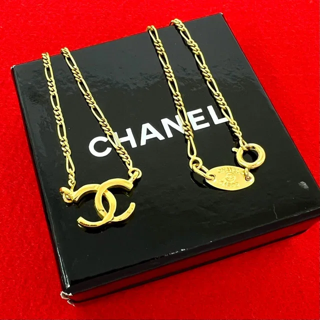 Chanel With Vintage CC Logo Motif Necklace Gold in Gold from The Reluxe