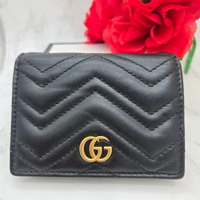 Gucci Bifold Wallet GG Marmont Quilted Black in Black Leather from The Reluxe