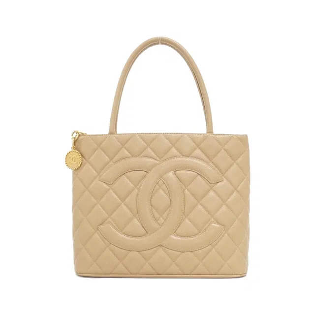 Chanel Bag Handbag Beige in Beige Caviar leather from The Reluxe