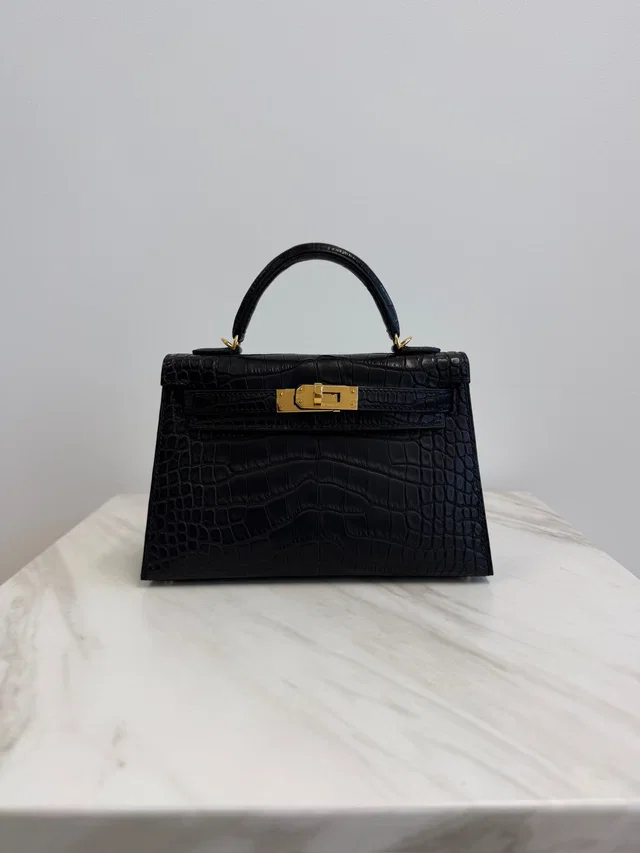 Hermès Mini Kelly Black Matte Alligator Gold Hardware in Black Crocodile from Luxury Promise