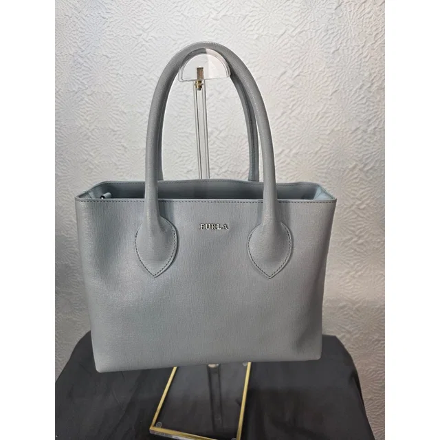 Furla Era Light Blue Saffiano Leather Tote Bag Structured Handbag in blue Saffiano leather from Poshmark