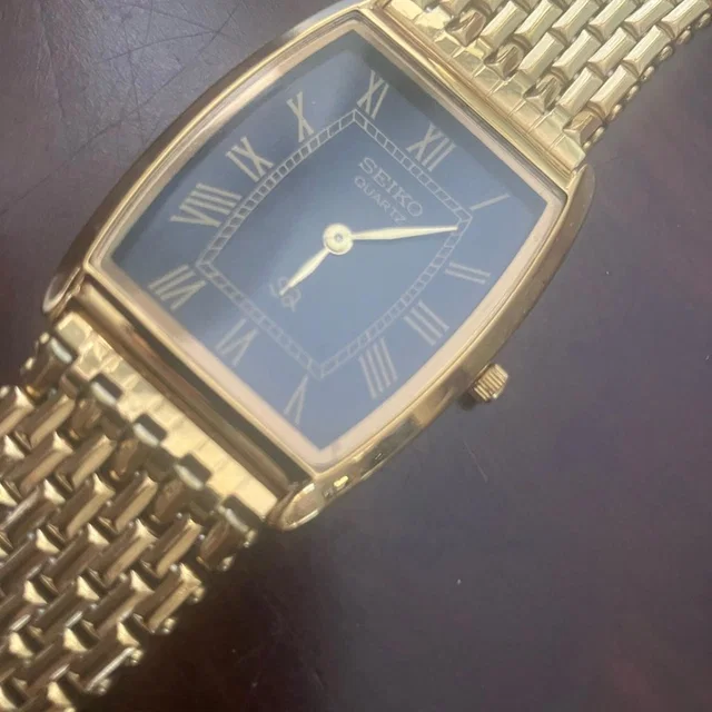 Seiko Gold Rectangular Watch W/Black Dial 33mm Rare Vintage in gold|black from Poshmark