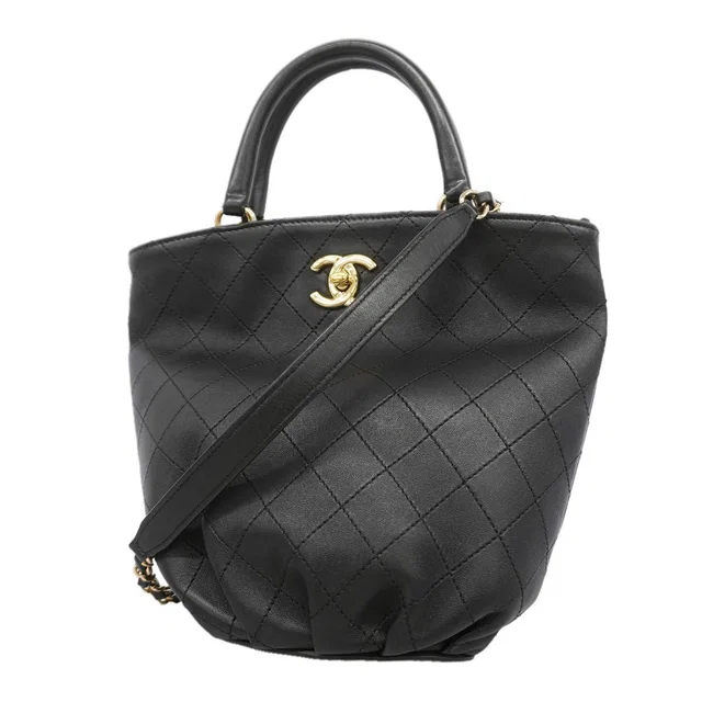 Chanel Handbag Quilted Lambskin Black Champagne Gold 2-Way Bag in Black Lambskin from The Reluxe