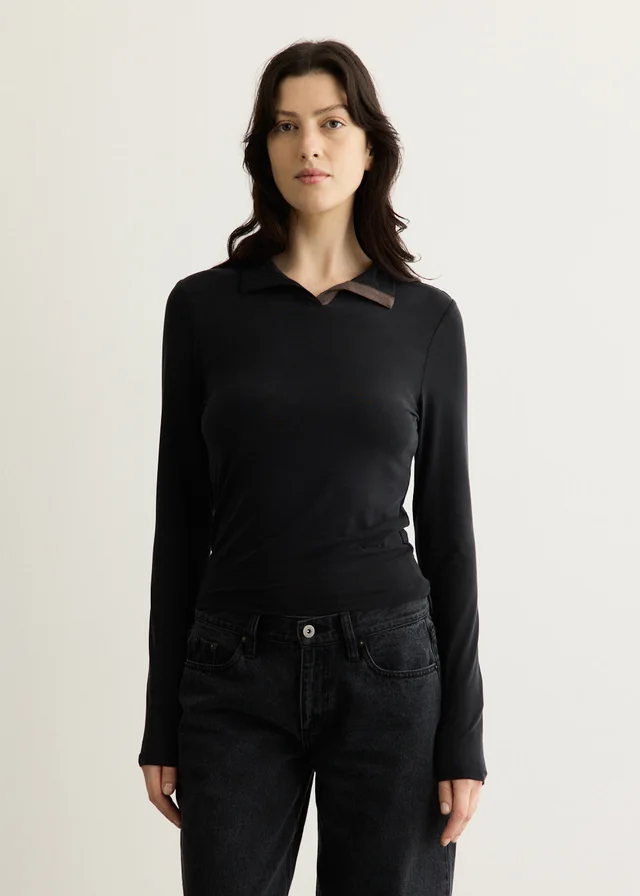 Incu Collection Prep Polo Long Sleeve Top in Black from Incu, photo 1 of 1
