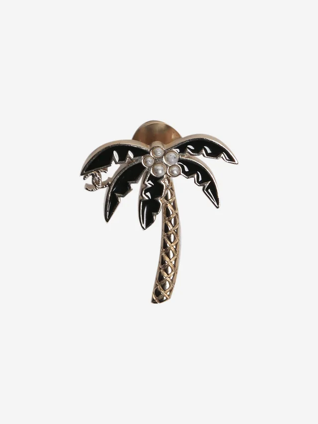 Chanel Gold and black palm tree pin brooch in Black from Sign of the Times