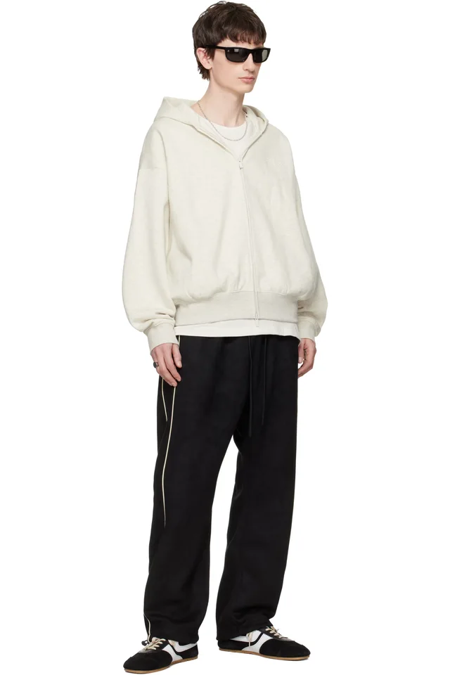 Fear of God ESSENTIALS Black Signature Relaxed Track Pants, photo 4 of 4 from SSENSE