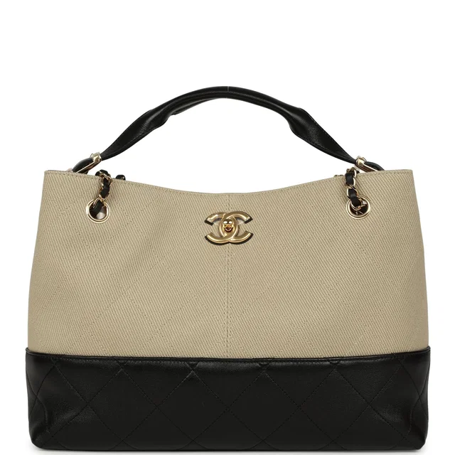 Chanel Small Coco Base Hobo Bag Beige Canvas and Black Shiny Lambskin Gold Hardware in Black Lambskin from Madison Avenue Couture
