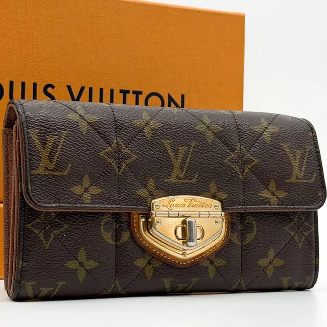 Louis Vuitton Pass Portefeuille Etoile Monogram Wallet from The Reluxe