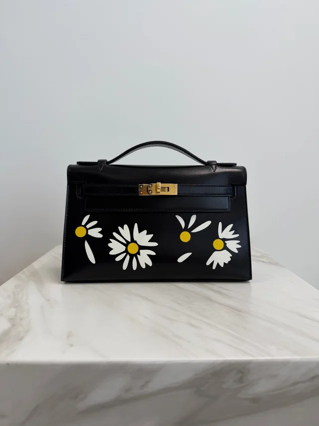 Hermès Kelly Pochette Marquete Noir/ Blanc/ Jaune De Naples Box Leather Gold Hardware in Black Box leather from Luxury Promise