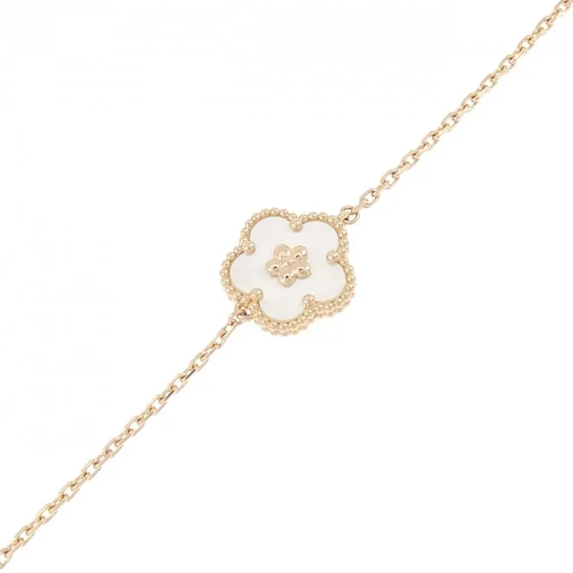 Van Cleef & Arpels Lucky Spring Plum Blossom Bracelet from The Reluxe