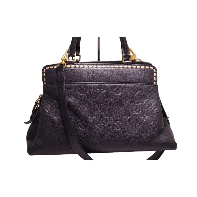 Louis Vuitton Monogram Empreinte Vosges MM 2-Way Handbag from The Reluxe