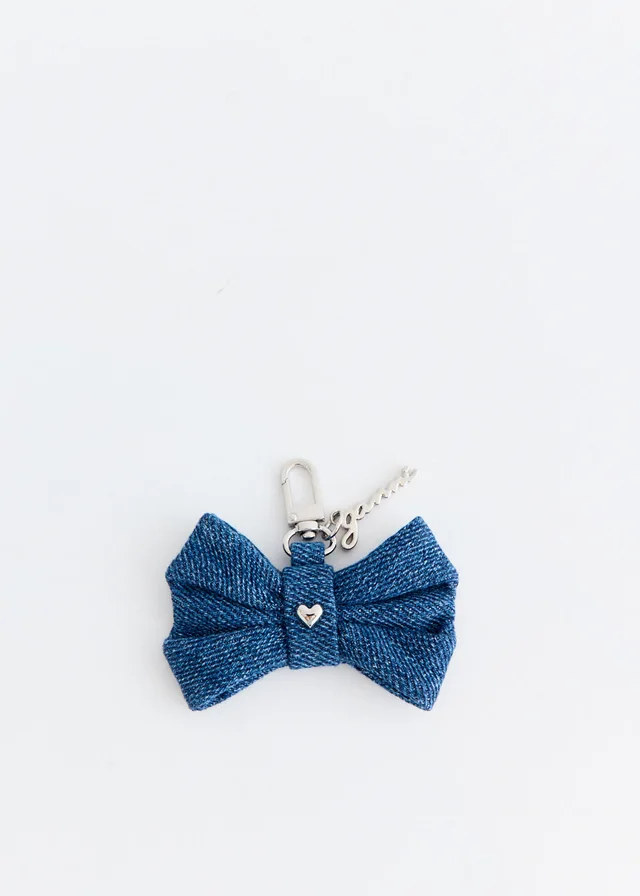 Ganni Denim Bow Charm in Blue from Incu, photo 1 of 1