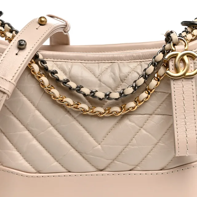 Chanel Aged Calfskin Chevron Quilted Small Gabrielle Hobo Ivory in White Calfskin from FASHIONPHILE, photo 8 of 12