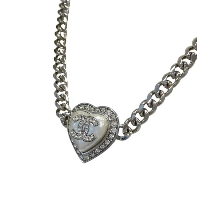 Chanel CC Logo Heart Chain Necklace Silver Colored in Silver from The Reluxe
