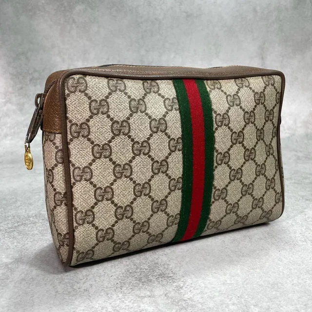 Gucci GG Sherry Line Clutch Brown Logo Leather in Brown Leather from The Reluxe