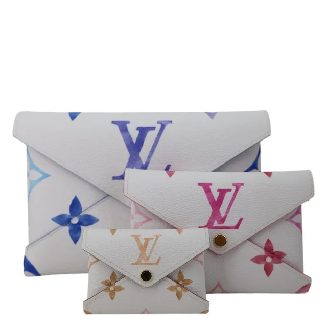 Louis Vuitton By The Pool Kirigami Set Giant Monogram Canvas Pochette Set Multicolor in Multicolor Coated canvas from Dallas Designer Handbags