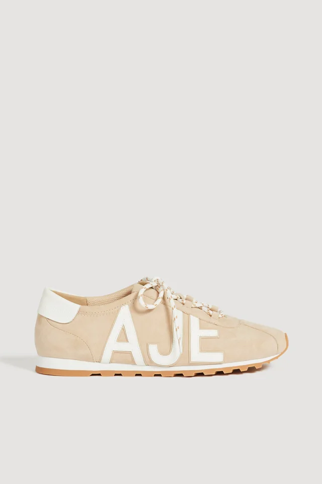 AJE Valli Logo Trainer in Beige from Aje, photo 1 of 1