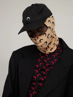 Marine Serre Beanie hat with graphic print in 88% Recycled Polyamide, 12% Elastane, photo 2 of 4 from LUISAVIAROMA