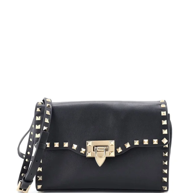 Valentino Garavani Rockstud Flip Lock Flap Bag Leather Medium in black Leather from Rebag