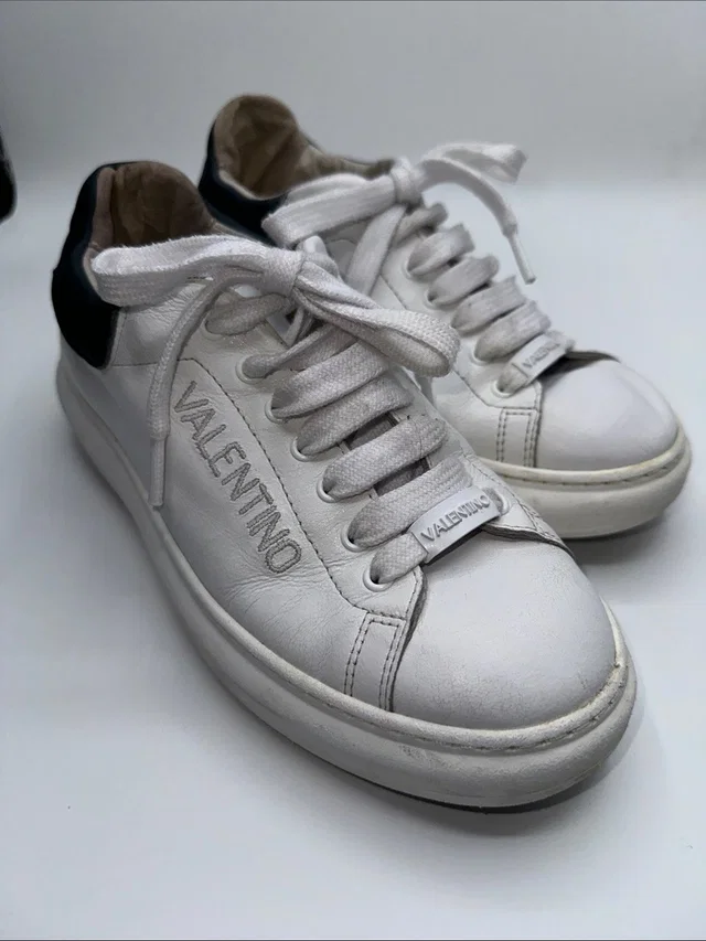 Valentino Garavani White Leather Sneakers With Black Heel Accent in black|white Leather from Poshmark