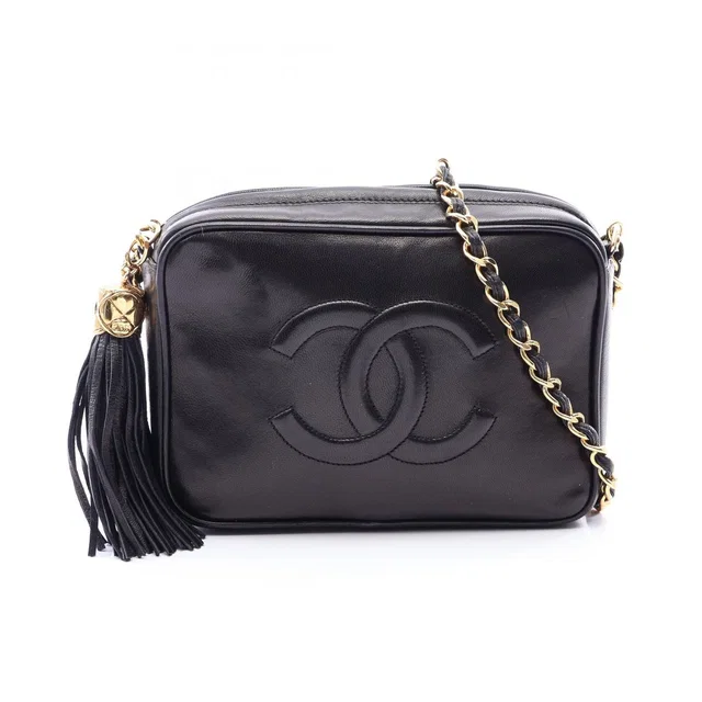 Chanel Shoulder Bag CC Logo Black Lambskin Fringe Chain in Black Lambskin from The Reluxe
