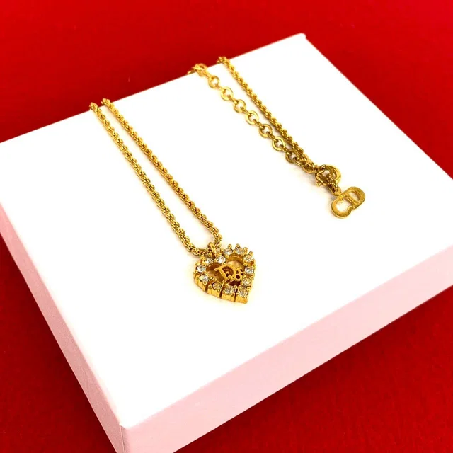 Dior Vintage Logo Motif Pendant Gold in Gold from The Reluxe