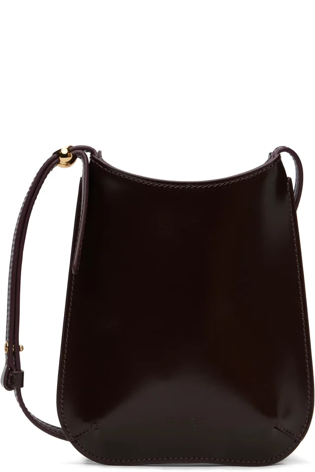 Burgundy 'The Bisou phone pouch' Bag, image 1 of 1 from SSENSE