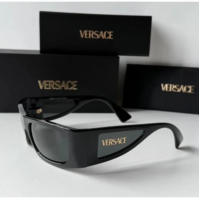 Versace Women's Oversized Sunglasses - Black in black from Depop, photo 4 of 9