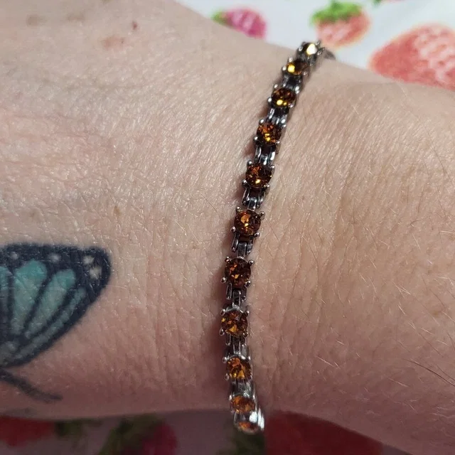 Swarovski Orange Crystal Bolo Bracelet in gray|orange|silver from Poshmark