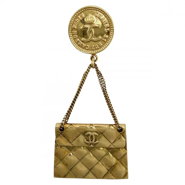 Chanel 94P Brooch Quilted Bag Motif CC Logo Swing Vintage Gold Plated in Gold from The Reluxe