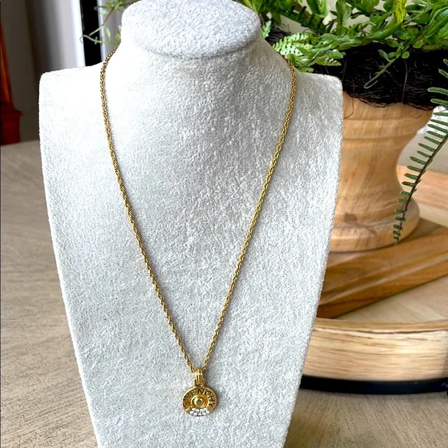 Givenchy Medallion Vintage Pendant Necklace in gold from Poshmark