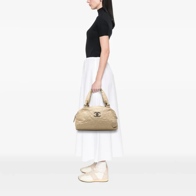 Beige Chanel CC Quilted Aged Calfskin Coco Rider Bowling Bag in Beige Calfskin from Designer Revival, photo 10 of 11